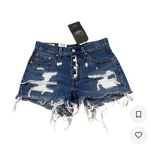 Levi’s 501 mid rise fly button distressed ripped denim jean shorts